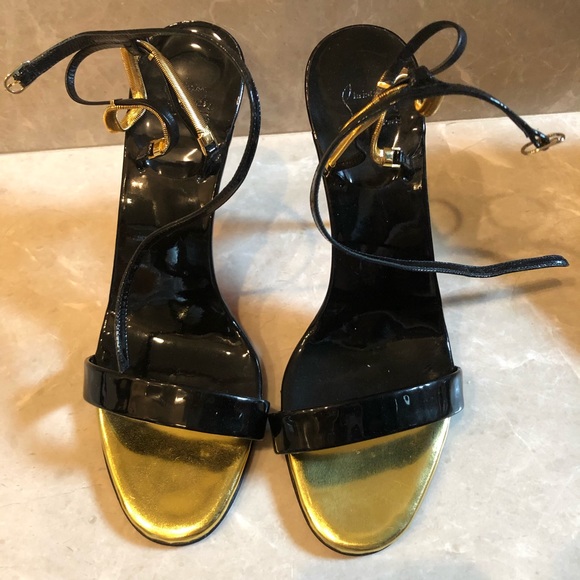 louboutin black and gold heels